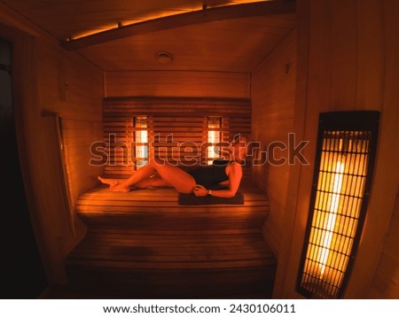 A girl lies in an infrared bath in the Rakvere spa center. High quality photo