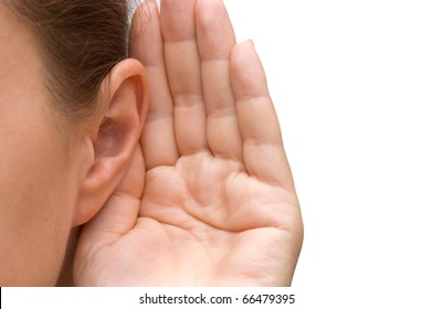 Girl Listening With Her Hand On An Ear
