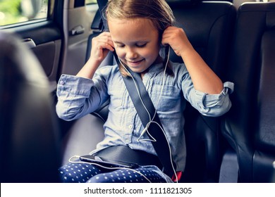 Girl Listening To Music In The Car