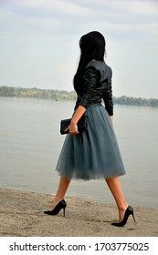 
Girl With Long Hair In A Tulle Skirt