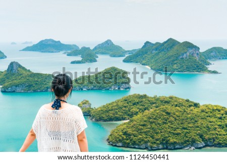 A girl looking to beautiful landscape Mu Ko Ang Thong National Marine Park in Surat Thani Province, Thailand, Southeast Asia