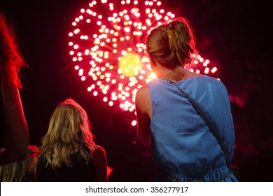 Girl Looks To Firework Show