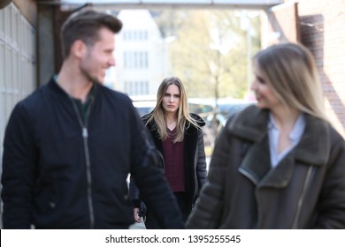 Girl Looks Jealous At Her Ex Boyfriend And Another Woman