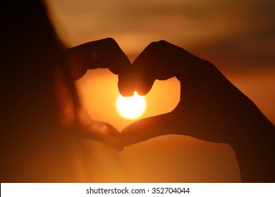 Girl in love enjoying tender moments at sunset during holiday with best friends. Emotional concept of happy exclusive lifestyle moment, sharing time, relaxing with nature contact.