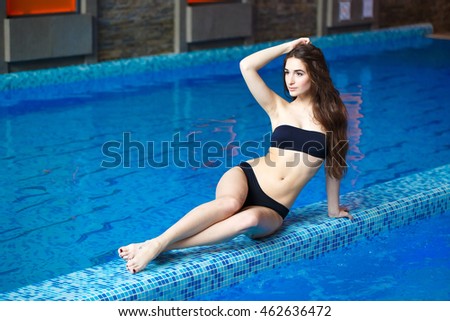 Girl lying near the pool.