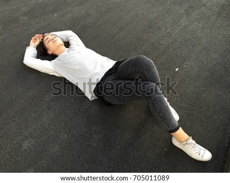 Similar – Athlete at the city park warming and stretching