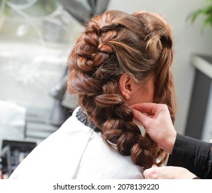 Girl Make French Braid Hairstyle In Salon