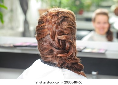 Girl Make French Braid Hairstyle In Salon