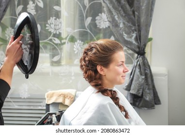 Girl Make French Braid Hairstyle In Salon