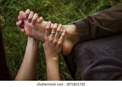 Girl Makes A Foot Massage To A Guy In Nature 1