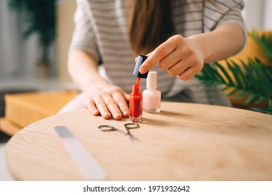 Girl Makes A Red Nail Polish