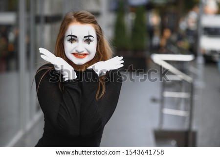 The girl with makeup of the mime. improvisation.