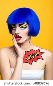 Girl With Makeup In The Style Of Pop Art Surprised