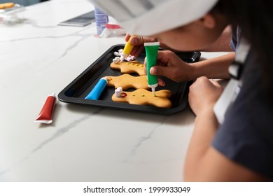 Girl Making Gingerbread Cookies Family
