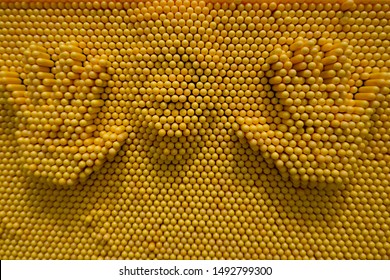 A Girl Making Hand And Face Print On Yellow Pin Board Toy