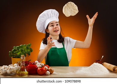 Girl making pizza dough - Powered by Shutterstock