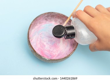 A Girl Making Slime Herself. Child Making Slime. 