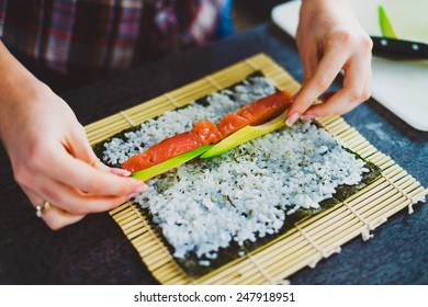 Girl Is Making Sushi At Home