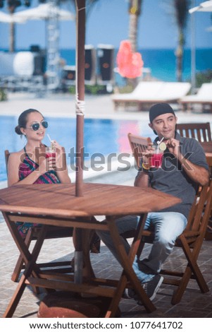 Similar – Image, Stock Photo Young people talking and drinking in summer party