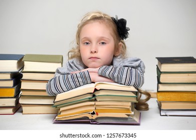 Girl With Many Books, Too Much Homework