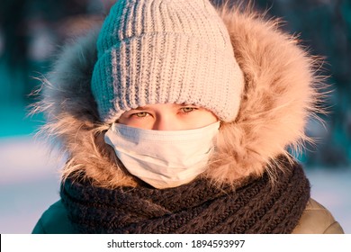 Girl In Medical Mask In Nature