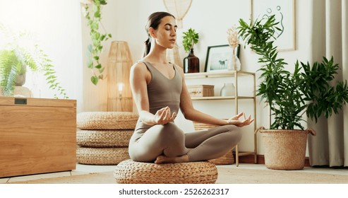 Girl, meditation and yoga at house for fitness zen, mindfulness development and lotus pose. Woman, relax and exercise with chakra energy, mental health peace and healing balance for self care - Powered by Shutterstock