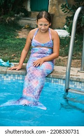 A Girl In A Mermaid Costume