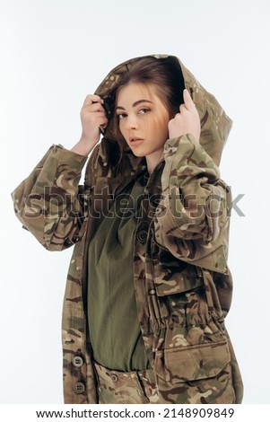 Girl in military uniform. Ukrainian. War in Ukraine. Bucha. on a white background