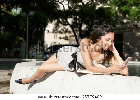 Similar – Image, Stock Photo Smiling brunette girl holding surfboard over her head