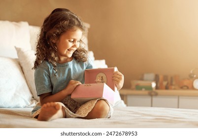 Girl, music box and ballerina toys in home with smile on bed for song, melody and sound by mockup space. Child, playful and happy in bedroom for listening, relax or harmony in morning in family house - Powered by Shutterstock