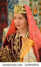 Girl in national clothes from Uzbekistan
