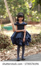 Girl With Navy Blue Frock