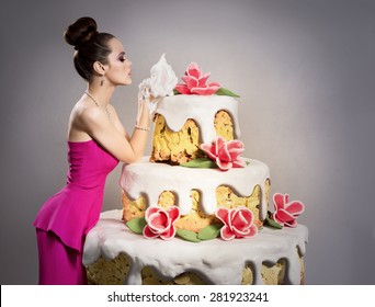 The Girl Near A Huge Birthday Cake