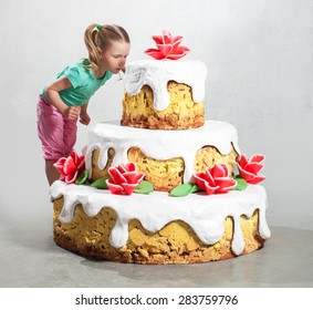 The Girl Near A Huge Cake