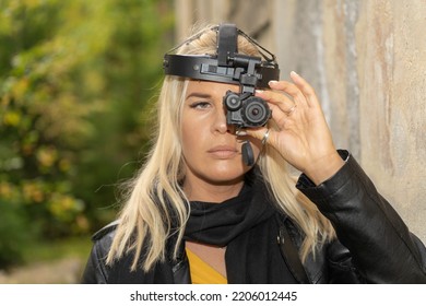 Girl With A Night Vision Monocular Close-up.