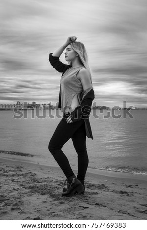 Similar – Portrait von einer jungen Frau mit Wind im Haar