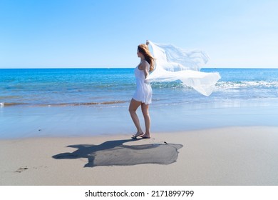 Girl On The Beach, Beautiful Woman With White Scarf On Summer Beach, Freedom And Relaxation, Fire Movement - Financial Independence Retire Early Concept