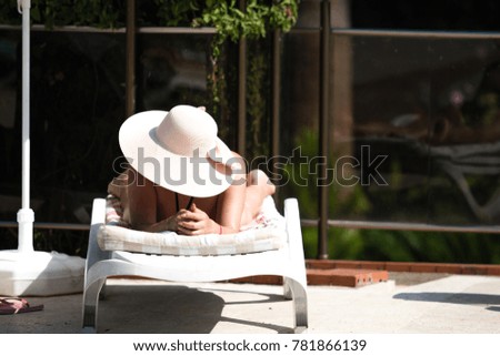 Similar – Young woman relaxing in a hammok