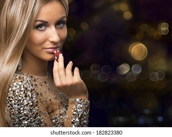 Girl On Boleh Background With Casino Chips