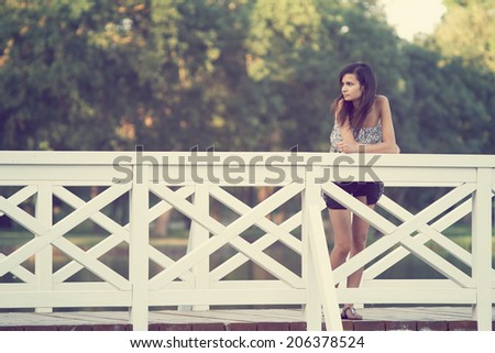 Girl on bridge