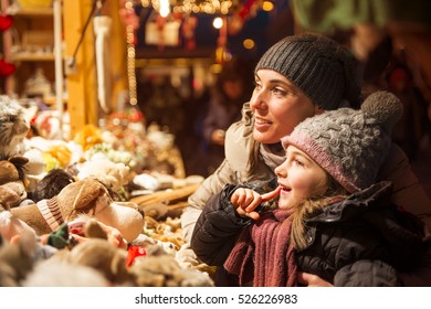 Girl on the christmas market at the gifts in december in South Tyrol
