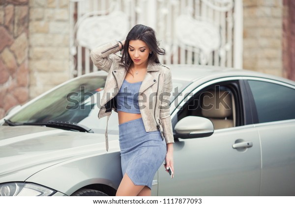 girl on the expensive\
car