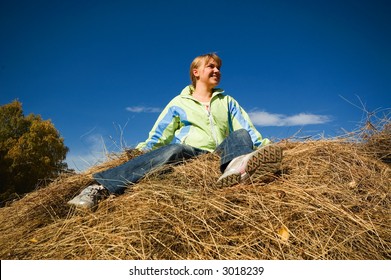 Girl on Haystack