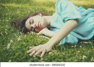 The Girl On The Lawn. Rest In Nature. Sleeping On The Lawn, To Dream. Dreamer. Stroking The Grass. Relaxation, Bliss, Rest. Sweet Sleep. Sweet Dreams.