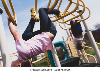 Girl On Monkey Bars