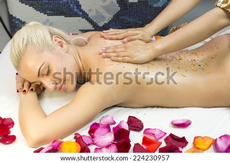 girl on procedure Balinese massage in the beauty salon