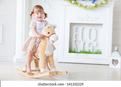 Girl on a rocking horse