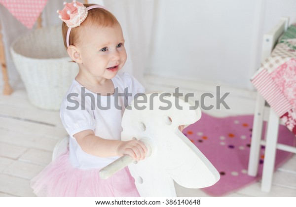girl on a rocking horse