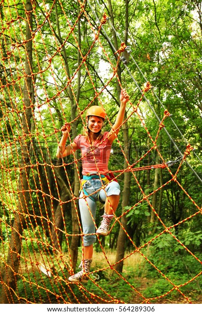 girl on rope Sports\
Park