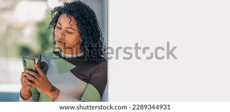 Similar – Brunette surfer woman with top and bikini kissing surfboard